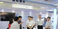 劉利華參觀防范和打擊利用無線電設(shè)備考試作弊專題展覽